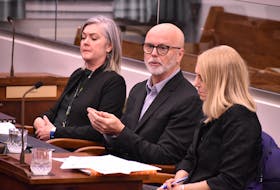 Dr. Kathie McNally, left, Dr. Michael Gardham and Corinne Rowswell from Health P.E.I. speak at a standing committee on health in Charlottetown on Feb. 1.  Alison Jenkins • The Guardian