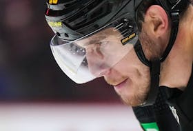 Vancouver Canucks' Bo Horvat prepares to take a faceoff during the third period of an NHL hockey game against the Chicago Blackhawks in Vancouver, on Tuesday, January 24, 2023.