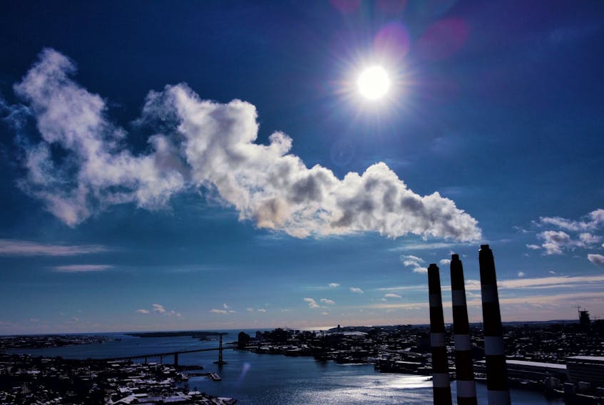 Emissions from Nova Scotia Power's Tufts Cove generating plant in Dartmouth are visible in this photo from February 2023. - TIM KROCHAK