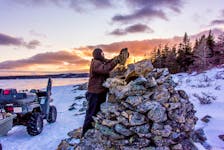 Here's my buddy Robert fixing up a rock cairn on the north side of Spider Pond. These were markers for winter travel. Contributed photo