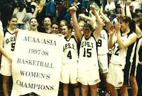 Eireann Rigby, 15, celebrates winning UPEI’s 1997-98 AUAA women’s basketball championship with her teammates. UPEI Photo • Special to The Guardian