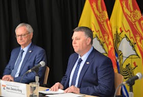 Premier Dennis King, right, and New Brunswick Premier Blaine Higgs address the media during a Feb. 20 press conference after the Council of Atlantic Premiers met in Charlottetown. Terrence McEachern • The Guardian