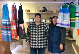 Judy Fletcher, left, is the owner of the NL Mi’kmaq Trading Post in Deer Lake. Her cousin, Donna Fudge, made the ribbon skirts that are sold at the store. – Contributed