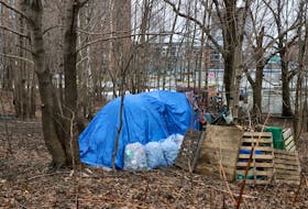 A tent belonging to an unhoused person, is seen in a Geary Street lot, Tuesday February 21, 2023