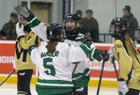 P.E.I.’s Alexa Carpenter, right, celebrates with teammate Jamie MacAulay after scoring a goal in the Canada Games ringette quarter-finals against Manitoba Feb. 23 in Montague.  
Jason Malloy • SaltWire Network