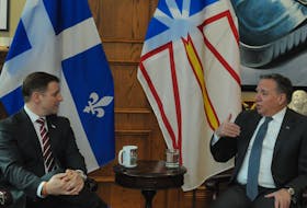 Premier Andrew Furey (left) talks with Quebec Premier Francois Legault in Furey’s 8th-floor office in the Confederation Building in St. John’s Friday morning, Feb. 24. Joe Gibbons • The Telegram