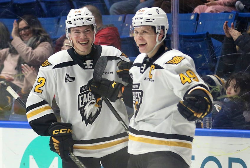 Ivan Ivan of the Cape Breton Eagles, right, celebrates after scoring a goal with teammate Olivier Houde during Quebec Major Junior Hockey League action at Centre 200 in Sydney on Sunday. Cape Breton won the game 9-8.