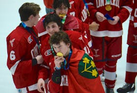 Ontario’s Matthew Schaefer kisses his gold medal after scoring the golden goal in double overtime of the Canada Games hockey final with Saskatchewan Feb. 25 at the Eastlink Centre.Jason Malloy • SaltWire Network