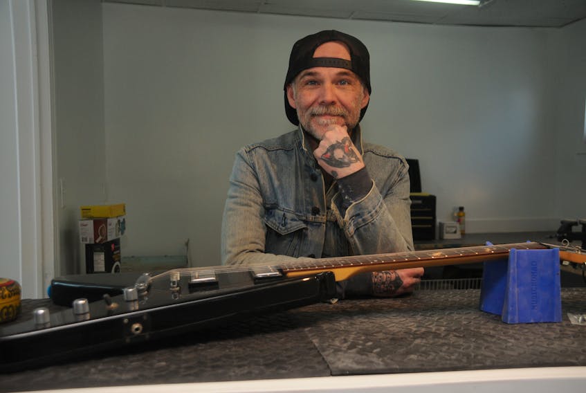 Chris Kearsey always wanted to open his own guitar repair shop in St. John's, and now he's weeks away from doing so. — Andrew Robinson/The Telegram