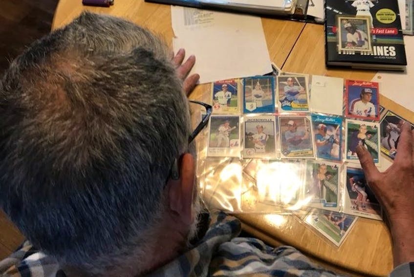  Steve Whitzman, with some of his more than 31,000 Montreal Expos trading cards.