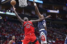 Toronto Raptors forward Pascal Siakam (43) shoots the ball as Houston Rockets forward Bruno Fernando (20) defends during the third quarter at Toyota Center.