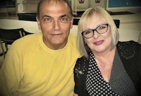 Blaine Aucoin, left, and Deborah Goudreau-Aucoin, early in their relationship in 2018 at the Royal Canadian Legion in Dominion. Aucoin introduced his then wife-to-be to darts and cars which she immediately loved. CONTRIBUTED