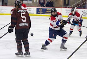 Jill Turko, a defenceman with the Acadia Axewomen, rips a shot on net during Atlantic Collegiate Hockey Association action with the Holland College Hurricanes on Feb. 5.