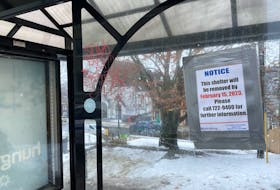 On Monday afternoon, a sign on a bus shelter near The Gathering Place says the shelter would be removed by Feb. 15. -Juanita Mercer/SaltWire Network