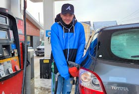 Peter McDougall braved record cold temperatures to get gas at Ken’s Corner in Charlottetown on Feb. 4. Temperatures in Charlottetown dropped down to -27.1 C during the early hours of the day, with the windchill making it feel like -40 C to -45 C. Logan MacLean • The Guardian