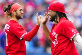 Vladimir Guerrero Jr. and Bo Bichette of the Toronto Blue Jays celebrate defeating the Tampa Bay Rays in their MLB game at the Rogers Centre on July 1, 2022 in Toronto, Ontario, Canada.  