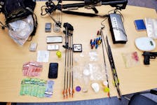 RCMP found and seized cocaine, crack cocaine, oxycodone pills, drug trafficking items, cash, a crossbow, arrows, shotgun rounds and an imitation handgun while searching a home in Clarenville on Tuesday, Feb. 7. Contributed