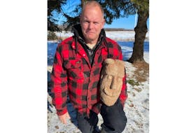 While cutting his lawn last summer, Cape Wolfe resident Carson Cross stumbled upon a large rock poking out of the ground. He dug it up and discovered it was actually a stone carving of a face.