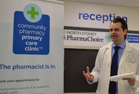 Trevor Russell, pharmacist at PharmaChoice in North Sydney speaks about Community Pharmacy Primary Care Clinics during the grand opening of his clinic on Thursday. There's a second clinic at Shoppers Drug Mart in Sydney. GREG MCNEIL/CAPE BRETON POST