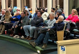A public gallery mainly consisting of taxi drivers and owners within the CBRM listen in during Tuesday night's municipal council meeting at city hall. IAN NATHANSON/CAPE BRETON POST