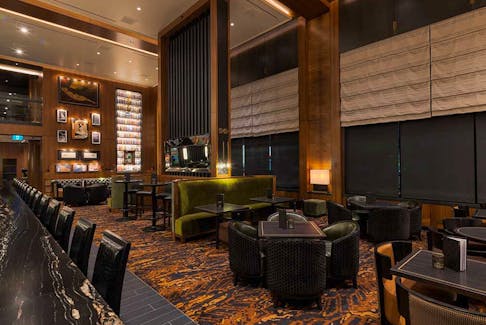  At Hy’s Steakhouse in Toronto, custom carpets and draperies help with soundproofing.