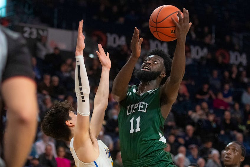UPEI Panthers guard Isaiah Ankra shoots over University of Victoria forward Izzy Helman during U Sports playoff action in Halifax on Friday, March 10, 2023.
Ryan Taplin - The Chronicle Herald