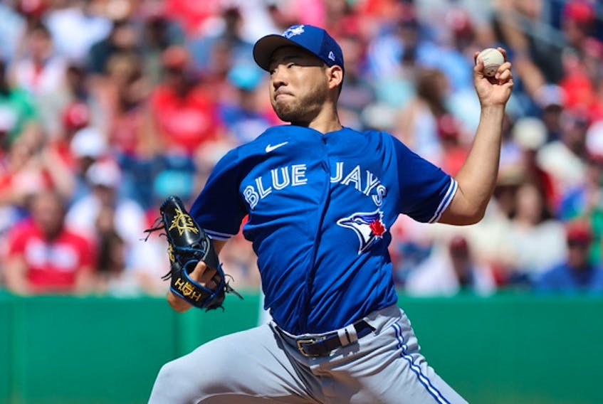 Blue Jays starting pitcher Yusei Kikuchi throws a pitch against the Philadelphia Phillies during the first inning at BayCare Ballpark. 