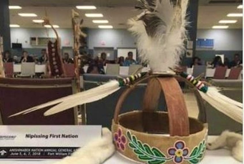 A headdress belonging to Nipissing First Nation Chief Scott McLeod was stolen when thieves took his Jeep Wrangler from a Mississauga hotel parking lot.
