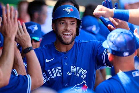 Toronto Blue Jays centre fielder George Springer (4) celebrates after he hit a home run against the Philadelphia Phillies during the third inning at BayCare Ballpark March 12, 2023 in Clearwater.