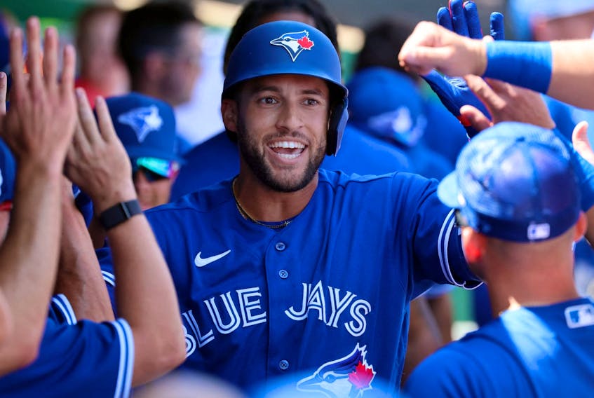 Toronto Blue Jays centre fielder George Springer (4) celebrates after he hit a home run against the Philadelphia Phillies during the third inning at BayCare Ballpark March 12, 2023 in Clearwater.