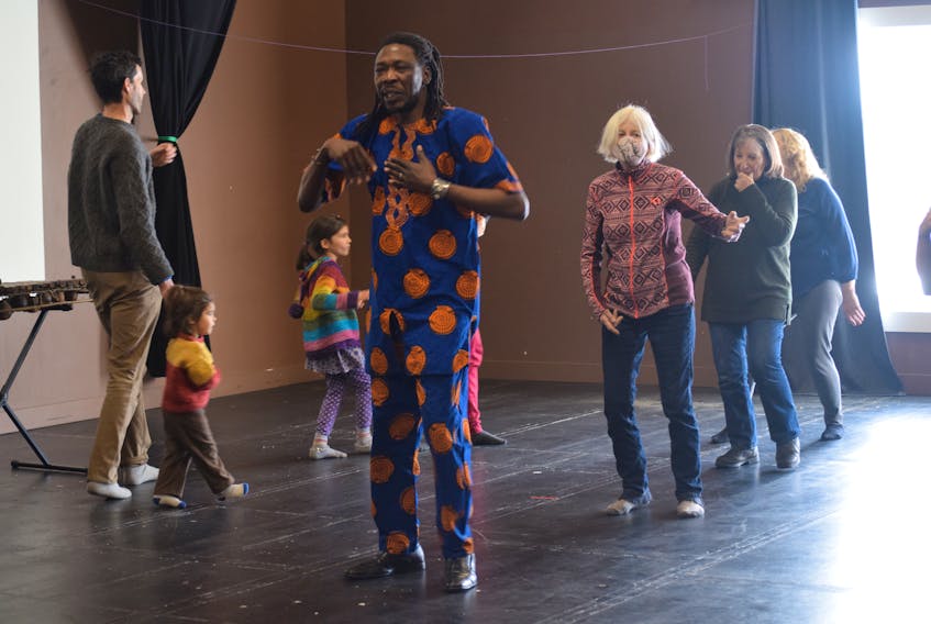 Visitors to the Ross Creek Centre for the Arts had the chance to dance to yankadi, a traditional style dance of Guinea. Mohamed Duranteau, centre, from Halifax, taught guests a few steps.