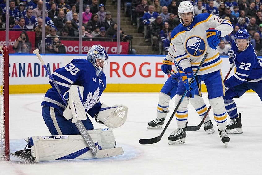 Toronto Maple Leafs goaltender Matt Murray (30) goes to make a save as Buffalo Sabres forward Dylan Cozens (24) looks for a rebound during the second period at Scotiabank Arena March 13, 2023.  