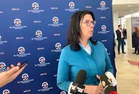 Antigonish MLA Michelle Thompson answers questions about consolidation after an announcement at St. Francis Xavier University. - Aaron Beswick