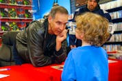  Comic book icon and Calgary native Todd McFarlane had hundreds of fans waiting for autographs at Video Game Trader.