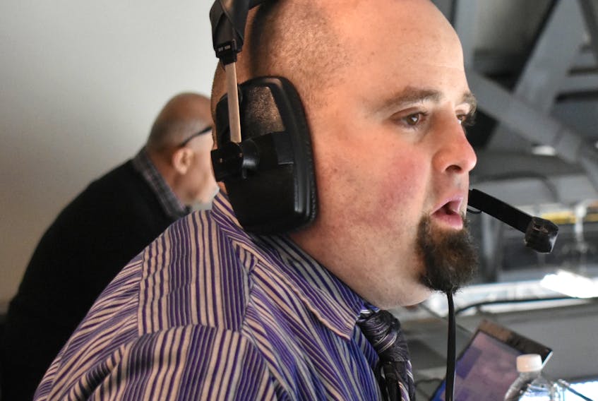 Pat McNeil, play-by-play broadcaster for the Cape Breton Eagles, is shown in action.