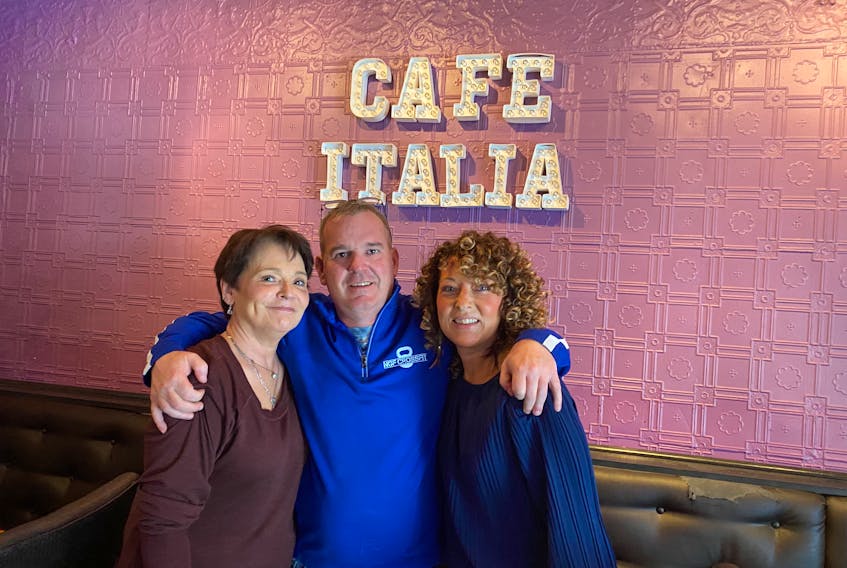 Cafe Italia will be closing on March 18. Pictured are owner Jeff Gillin, centre with employees Julie Moser, left, and Shara Lank, right. - Adam MacInnis