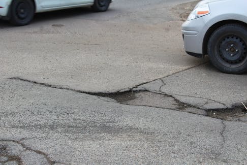 A pothole is pictured on Glenwood Street in Sydney on March 14, 2022. Anyone who spots a pothole is encouraged by the CBRM to contact 311 immediately so the issue can be repaired. SHANNON LEE/CAPE BRETON POST