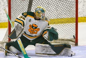 University of Alberta Golden Bears goalie Ethan Kruger, seen here in the Canada West championship against the University of Calgary Dinos at Father David Bauer Arena in Calgary on March 3, 2023, was knocked from the U Sports semi-final against the University of Prince Edward Island Panthers on Saturday, March 18, 2023. Alberta won 4-1 to earn a spot in Sunday's national final.