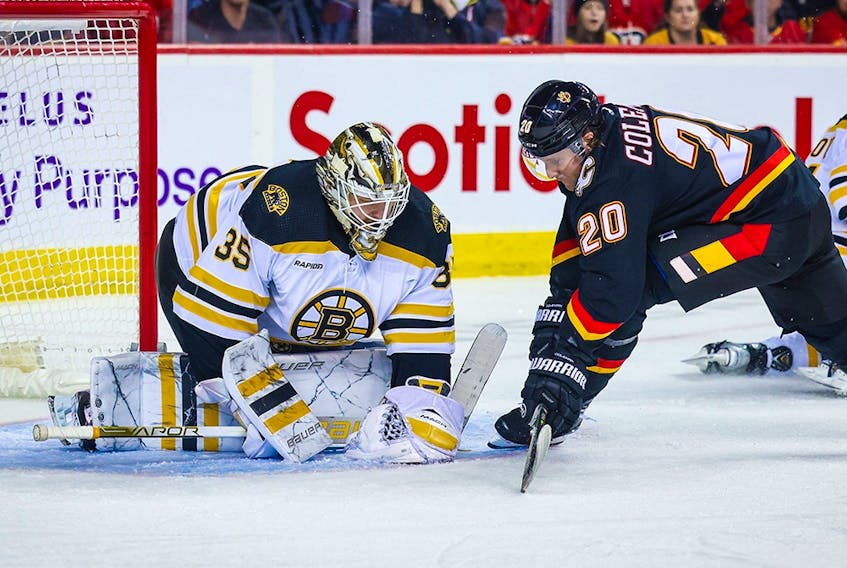  Boston Bruins goaltender Linus Ullmark (35) makes a save against Calgary Flames centre Blake Coleman (20) during the second period at the Scotiabank Saddledome on February 28, 2023.
