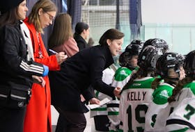 P.E.I. head coach Jess Cameron talks to her team during Canada Games girls’ hockey action March 1 against Newfoundland and Labrador at MacLauchlan Arena in Charlottetown.  
Contributed