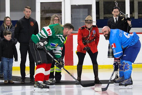 RCMP Const. Layla Fish prepares for the ceremonial puck drop between South Shore Two’s Andrew Dixon, left, and Blue Rockets Jean-Francois Desfosses March 18 during the Dave Wynn Memorial Classic hockey tournament in Lawrencetown. Dixon was Wynn’s partner when he worked as a paramedic on Nova Scotia’s South Shore.
Jason Malloy