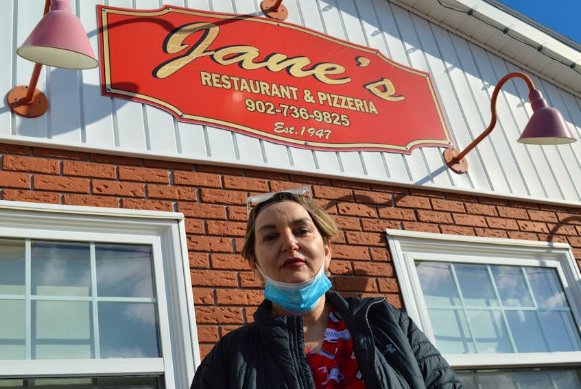 Mary Devoe, owner of Jane's Restaurant and Pizzeria in Little Bras d'Or, says she is seeking employees to work as grill cooks and pizza cooks in her restaurant. Until they can get more staff, Jane's will operate just five days a week. IAN NATHANSON/CAPE BRETON POST