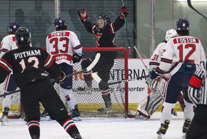 Truro Bearcats forward Sam Archibald, centre, celebrates his first period goal in Game 2 of the team's playoff series with the Valley Wildcats March 20 in Berwick.