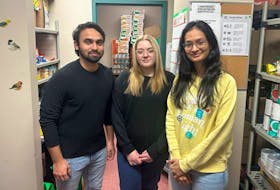 From left, Yasir Saleem, food bank outreach co-ordinator, Lily Walters, food bank co-ordinator, and Himali Shah Kadam, vice-president of finance and operations, help operate the student-run food bank at Cape Breton University. CONTRIBUTED