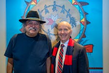 Alan Syliboy, left, pictured with King’s-Edgehill School’s headmaster Joe Seagram, hopes the Indigenous mural he created for the educational institute will serve as a permanent reminder that everyone is connected and must accept and learn about one another.