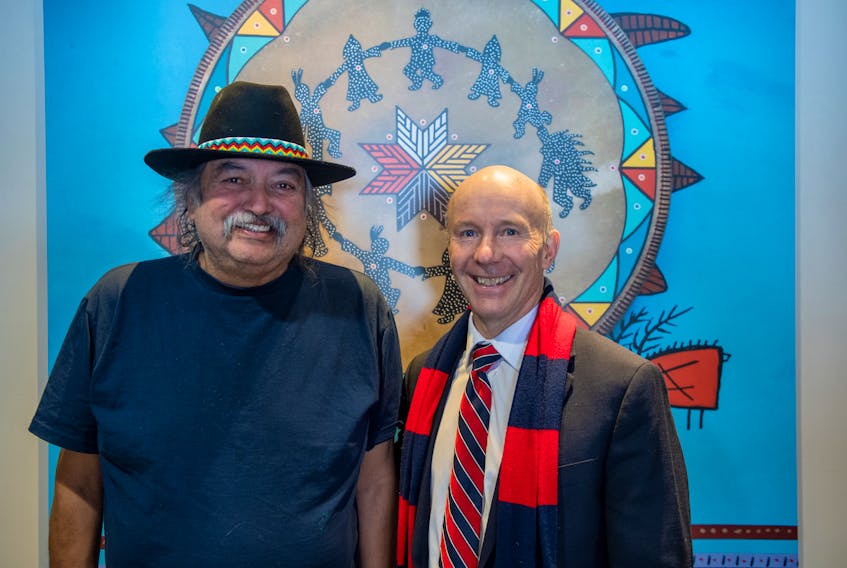 Alan Syliboy, left, pictured with King’s-Edgehill School’s headmaster Joe Seagram, hopes the Indigenous mural he created for the educational institute will serve as a permanent reminder that everyone is connected and must accept and learn about one another.