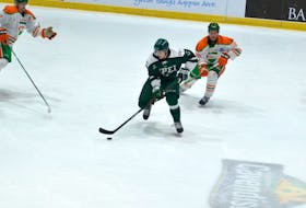 UPEI Panthers forward Kaleb Pearson carries the puck against the Université du Québec à Trois-Rivières (UQTR) Patriotes in the bronze-medal game of the Cavendish Farms University Cup at Eastlink Centre in Charlottetown on March 19. The Patriotes won the game 3-2.