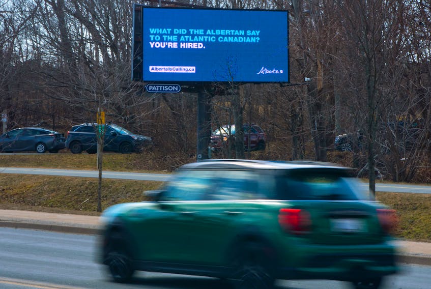 A vehicle passes by a digital billboard on Joseph Howe Drive on Tuesday. March 21, 2023. The Alberta government has an ad campaign designed to recruit workers to their province.
Ryan Taplin - The Chronicle Herald