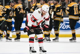 The Ottawa Senators' Claude Giroux reacts while the Boston Bruins celebrate in the background after their 2-1 win at the TD Garden on Tuesday. The Senators have lost six of their last seven and have fallen to 4-7-1 in March.