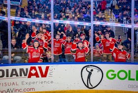 St. John’s Caps Minor Hockey players enjoy first period intermission activities during a Newfoundland Growlers game. PHOTO CREDIT: Jeff Parsons.